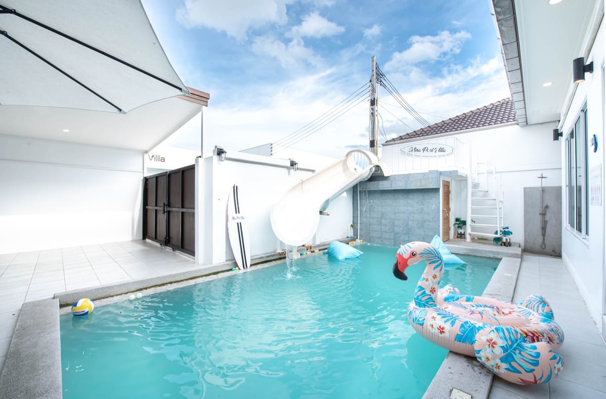 Private pool with waterslide at Mina Pool Villa, Pattaya